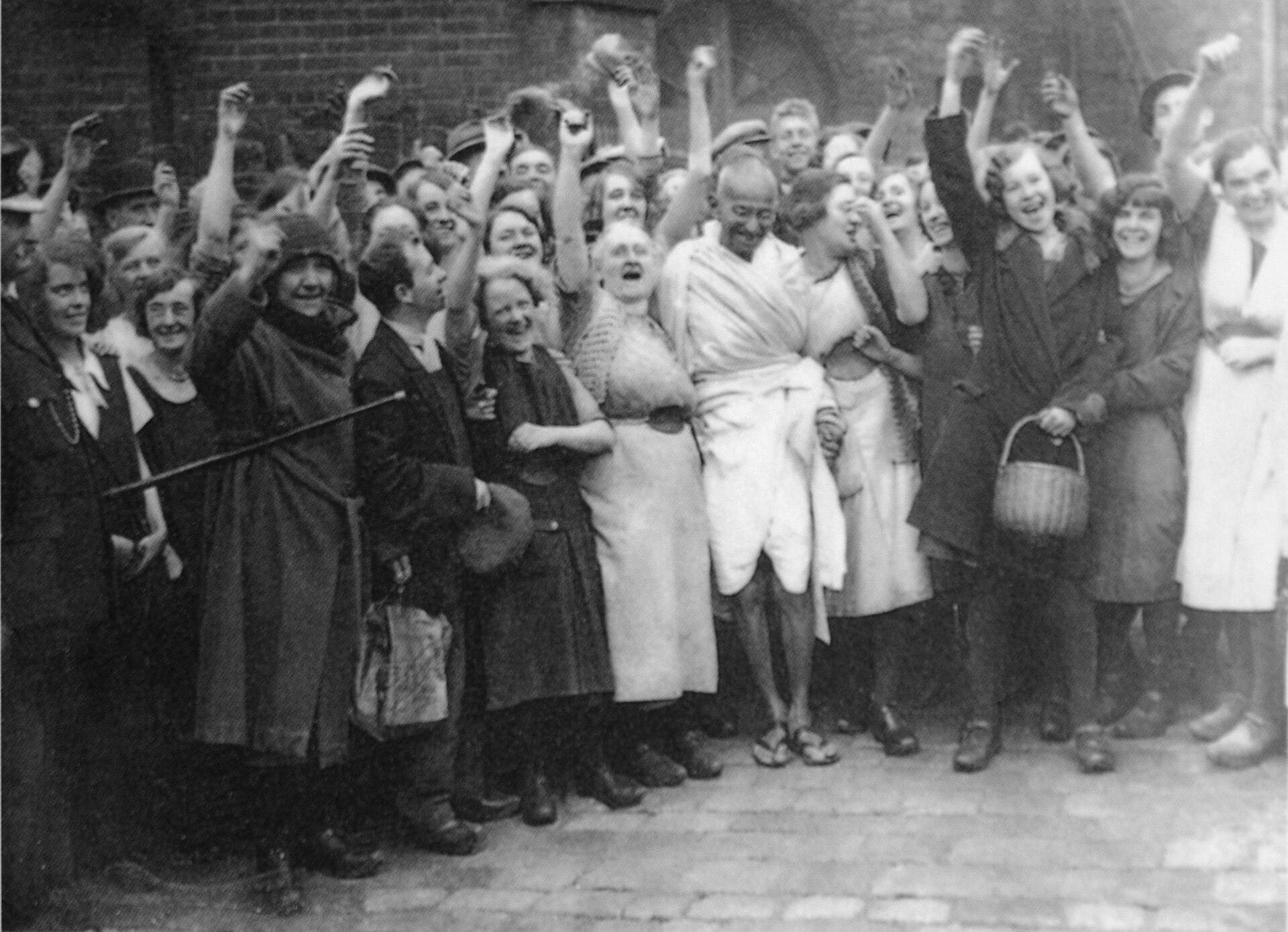 Visits Lancashire textile workers