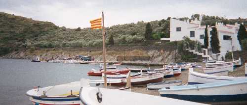 Returns to Portlligat